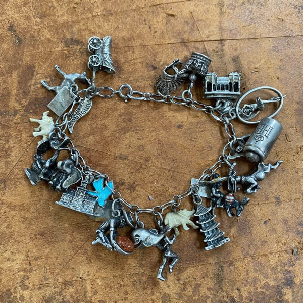 Vintage Sterling Silver 17 Charm Bracelet - Yourgreatfinds