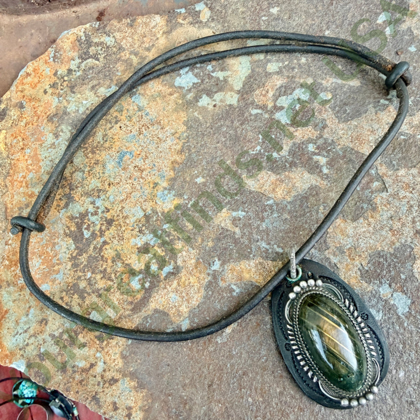 Navajo Sterling Silver Hawk’s Eye & Leather Necklace necklace