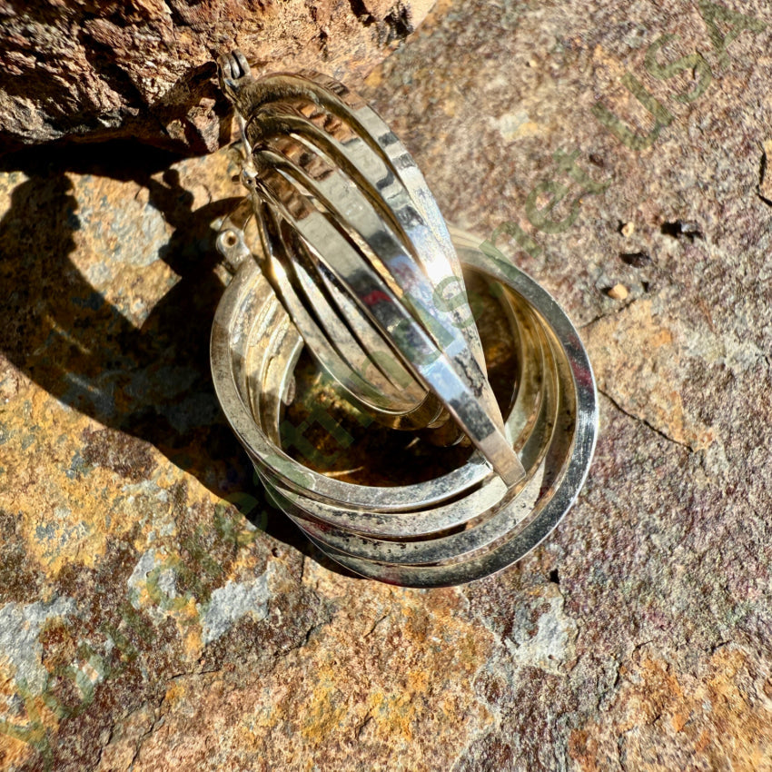 Sterling Silver Quadruple Hoop Pierced Earrings earrings