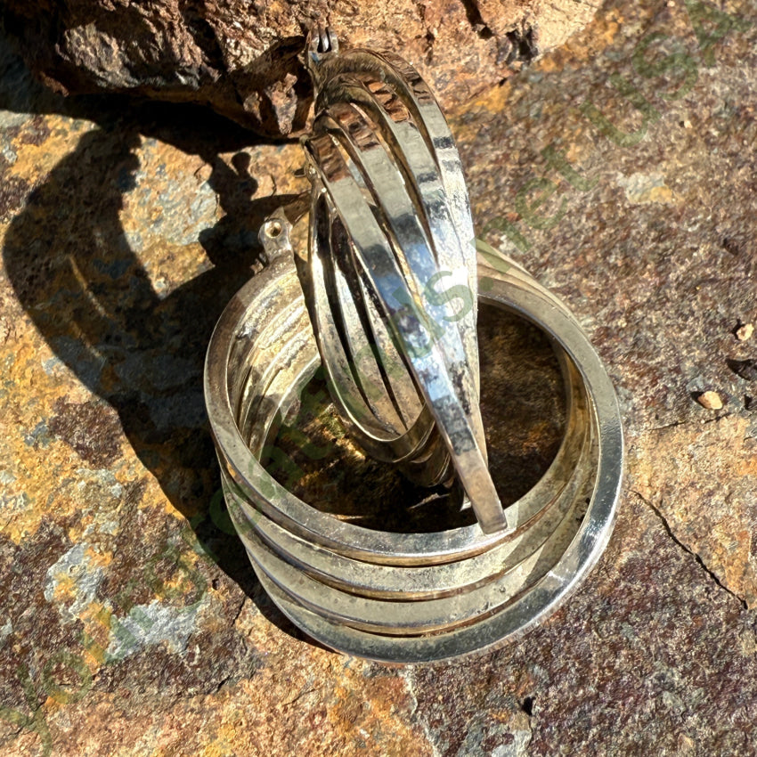 Sterling Silver Quadruple Hoop Pierced Earrings earrings