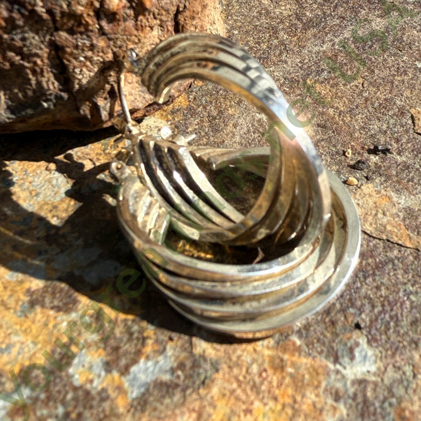 Sterling Silver Quadruple Hoop Pierced Earrings earrings