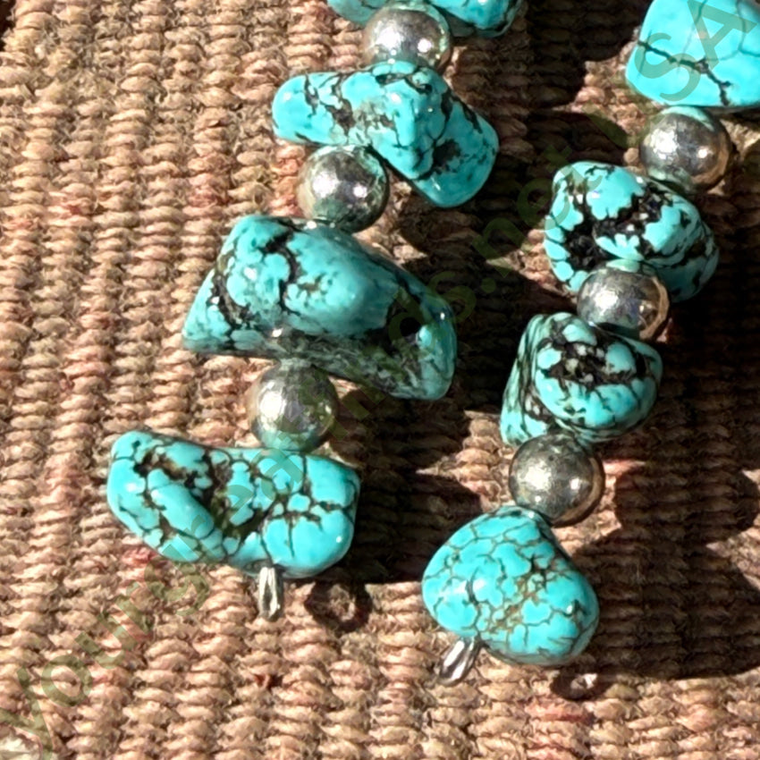 Sterling Silver & Spider Web Nugget Turquoise Pierced Earrings earrings