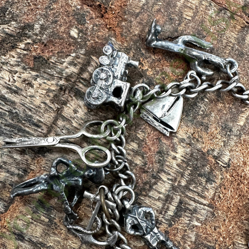 Sterling Silver Vintage 17 Charm Bracelet
