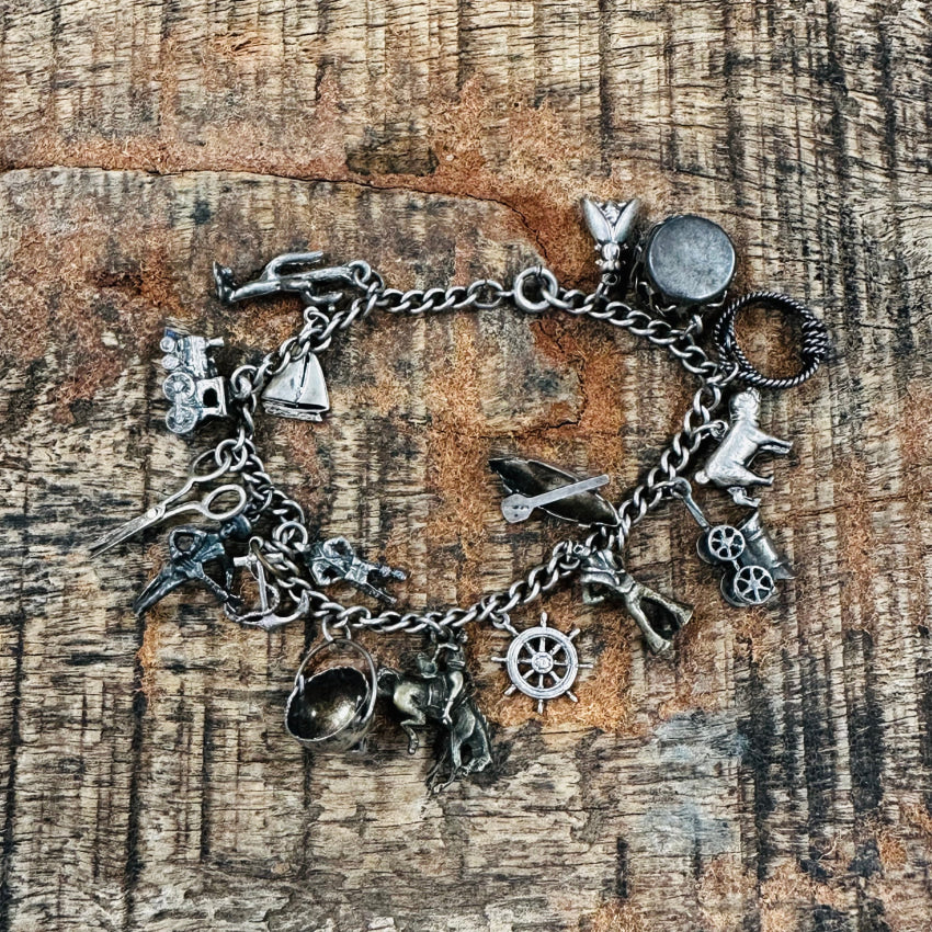 Sterling Silver Vintage 17 Charm Bracelet