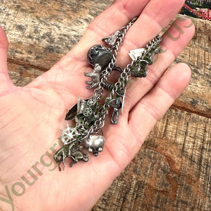 Sterling Silver Vintage 17 Charm Bracelet