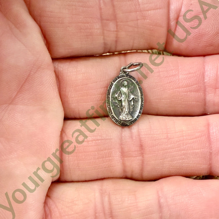 Tiny Time Worn Sterling Silver Miraculous Mary Pendant pendant