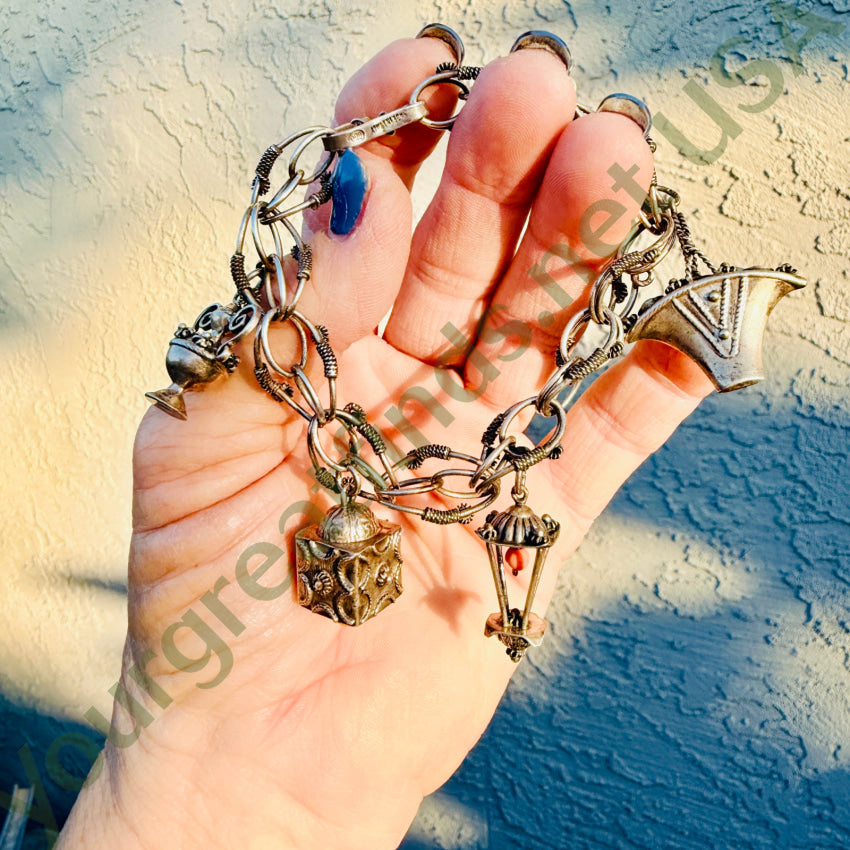 Vintage 800 Silver Italian Etruscan Revival Charm Bracelet bracelet