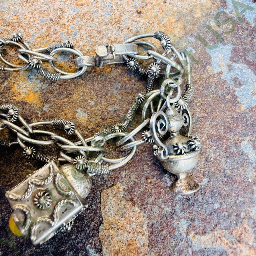 Vintage 800 Silver Italian Etruscan Revival Charm Bracelet bracelet