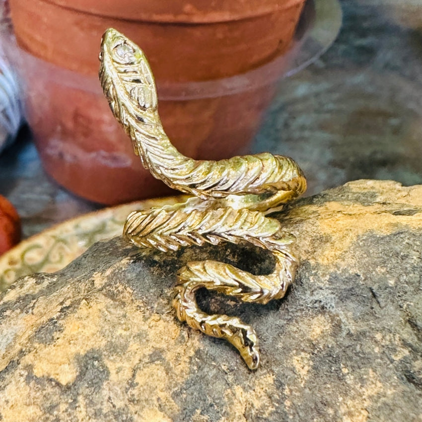 I crafted a snake ring using silver and gold. Swipe left for a closer look  at the intricate details. : r/snakes