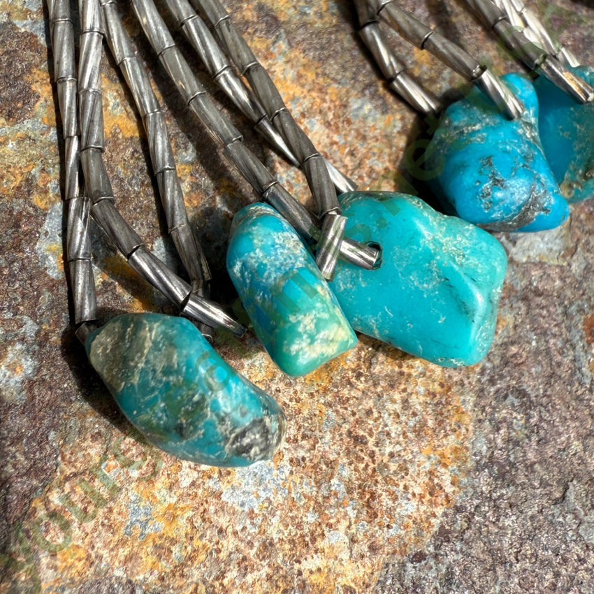 Vintage Sterling ’Liquid’ Silver Turquoise Nugget Pierced Earrings earrings