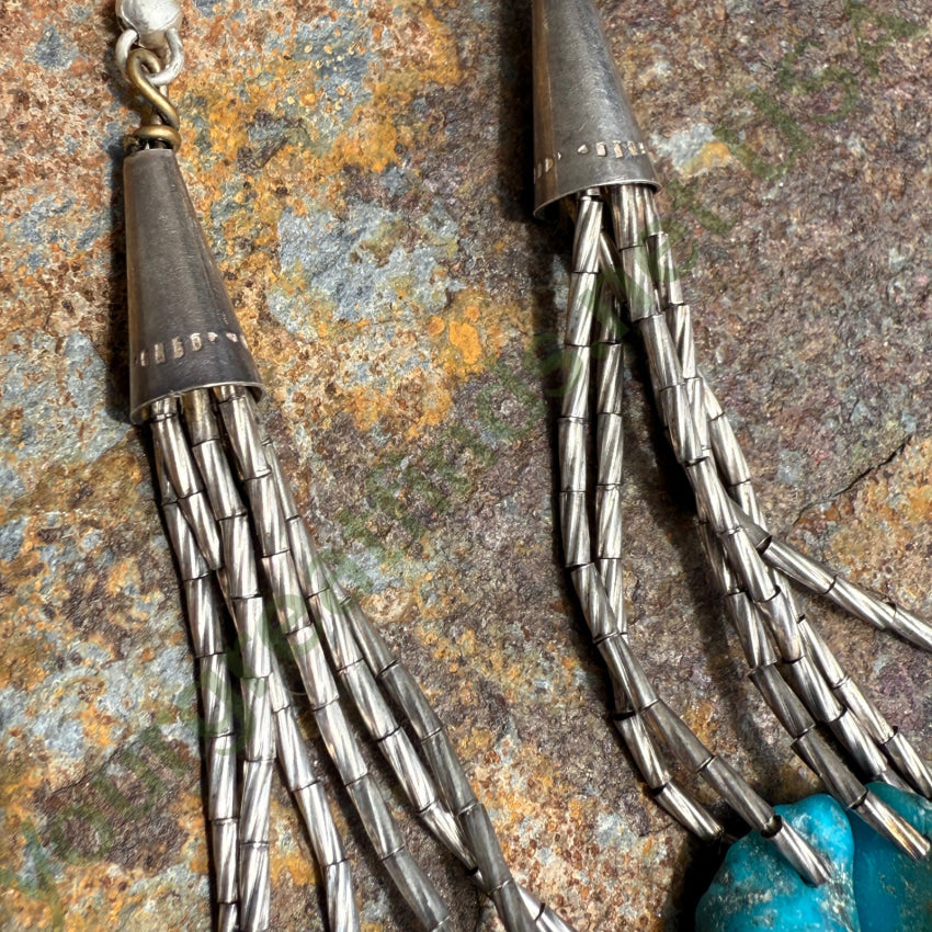 Vintage Sterling ’Liquid’ Silver Turquoise Nugget Pierced Earrings earrings