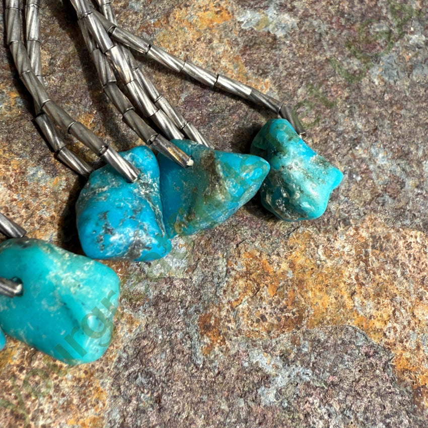 Vintage Sterling ’Liquid’ Silver Turquoise Nugget Pierced Earrings earrings