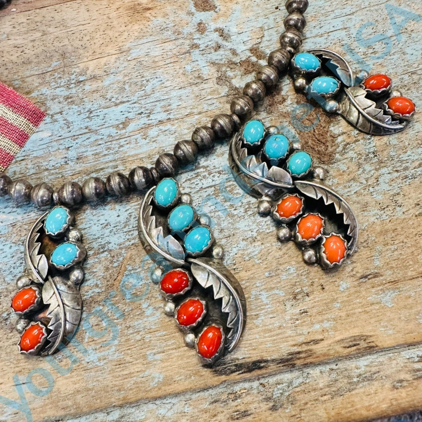 https://yourgreatfinds.net/cdn/shop/files/vintage-sterling-silver-bench-bead-turquoise-red-coral-necklace-928_1200x.jpg?v=1685411657