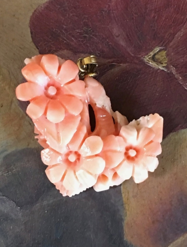 Carved on sale coral pendant